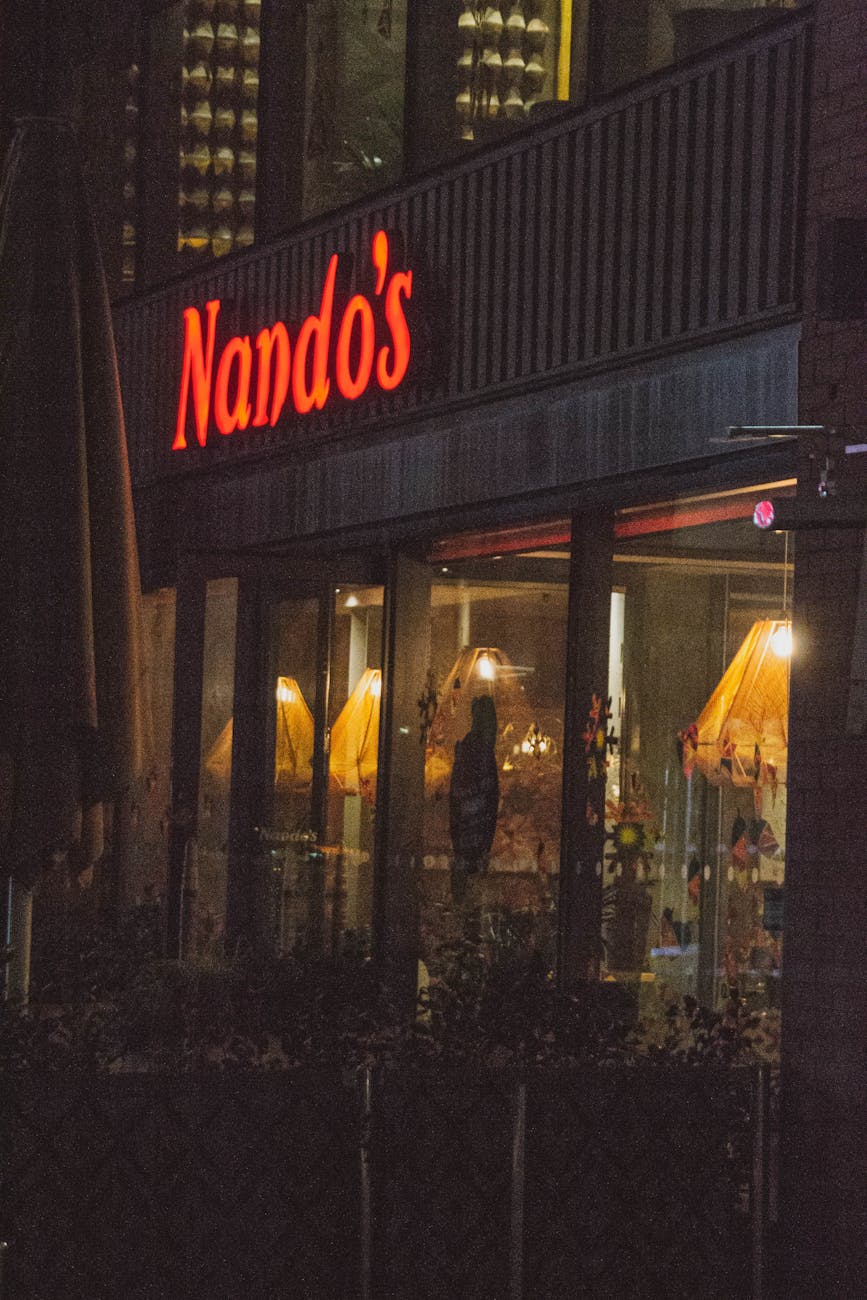 red lighted signage in front of the store